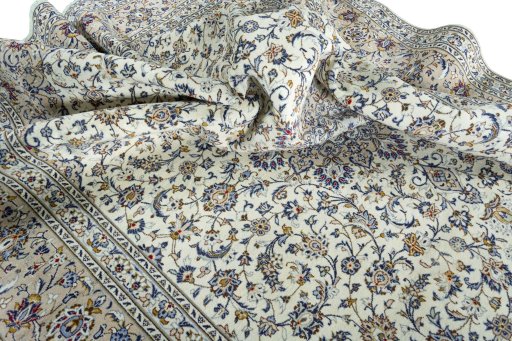 Surface texture of 2000s Kashan rug with natural Wool and intricate pattern