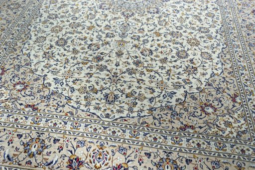Close-up detail of 2000s Kashan rug from Iran / Persia showing Wool weave