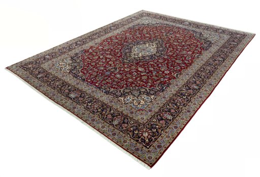 Corner detail of New Kashan rug showing border pattern and Wool pile