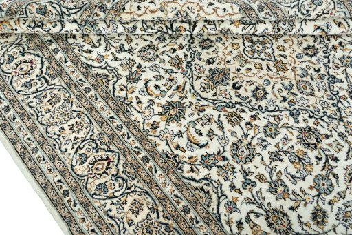 Close-up detail of 2000s Kashan rug from Iran / Persia showing Wool weave
