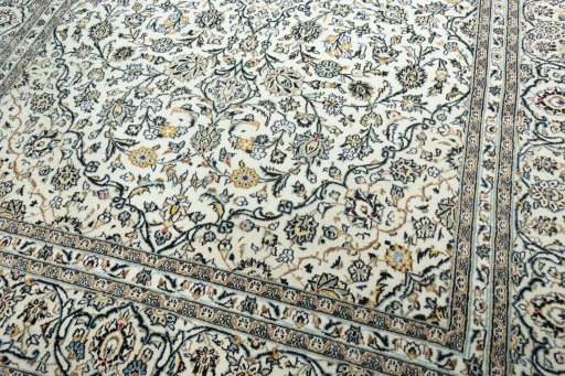 Close-up detail of 2000s Kashan rug from Iran / Persia showing Wool weave