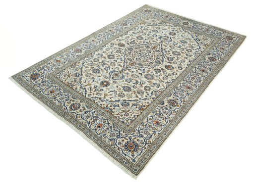 Corner detail of 2000s Kashan rug showing border pattern and Wool pile