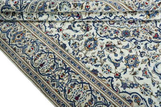 Close-up detail of 2000s Kashan rug from Iran / Persia showing Wool weave