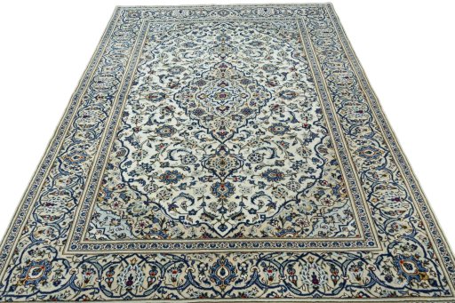 Surface texture of 2000s Kashan rug with natural Wool and intricate pattern