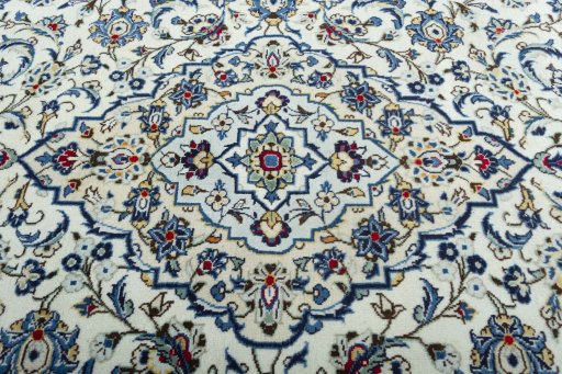 Central medallion detail of 2000s Kashan rug from Iran / Persia