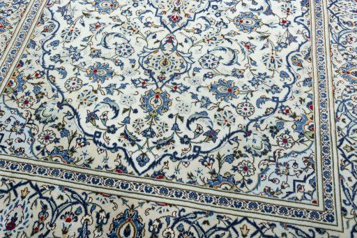 Close-up detail of 2000s Kashan rug from Iran / Persia showing Wool weave