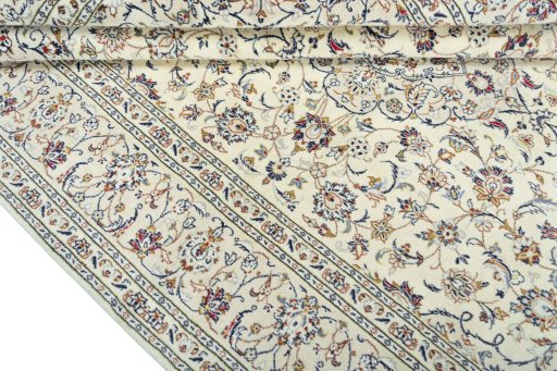 Close-up detail of 2000s Kashan rug from Iran / Persia showing Wool weave