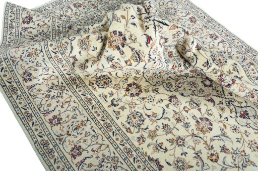 Surface texture of 2000s Kashan rug with natural Wool and intricate pattern