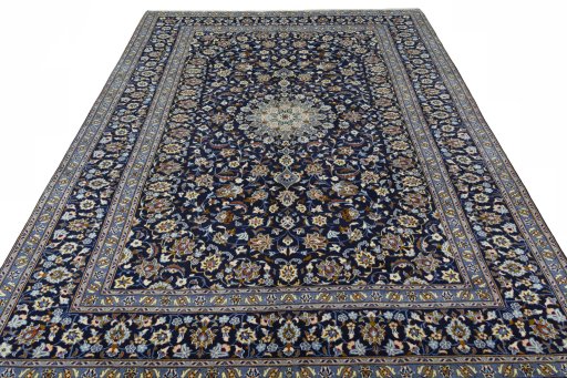 Surface texture of 2000s Kashan rug with natural Wool and intricate pattern