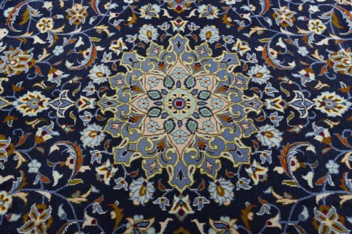 Central medallion detail of 2000s Kashan rug from Iran / Persia