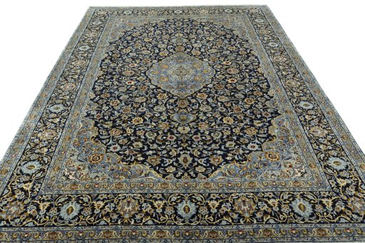 Surface texture of 2000s Kashan rug with natural Wool and intricate pattern