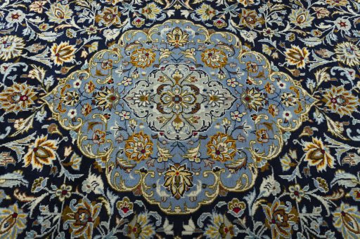 Central medallion detail of 2000s Kashan rug from Iran / Persia