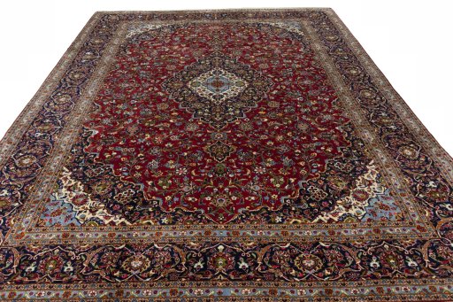 Surface texture of 2000s Kashan rug with natural Cork and intricate pattern