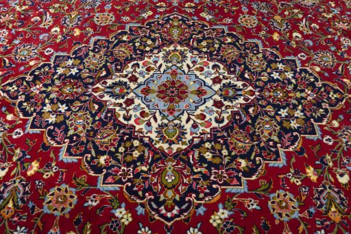 Central medallion detail of 2000s Kashan rug from Iran / Persia