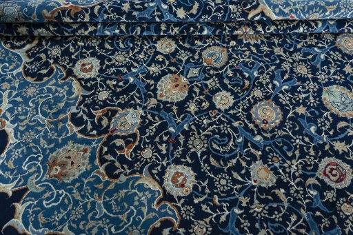 Close-up detail of 2000s Kashan rug from Iran / Persia showing Wool weave