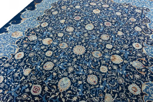 Backside of handmade 2000s Kashan rug showing knot structure and weave density