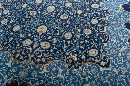 Close-up detail of 2000s Kashan rug from Iran / Persia showing Wool weave