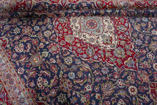 Close-up detail of 2000s Kashan rug from Iran / Persia showing Cork weave