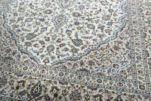 Close-up detail of 2000s Kashan rug from Iran / Persia showing Wool weave