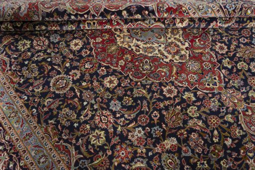 Close-up detail of 2000s Kashan rug from Iran / Persia showing Cork weave