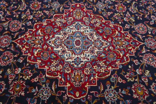 Central medallion detail of 2000s Kashan rug from Iran / Persia