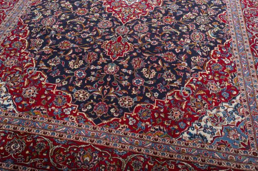 Close-up detail of 2000s Kashan rug from Iran / Persia showing Wool weave