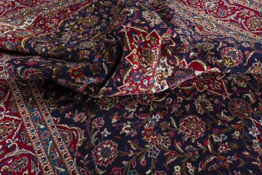 Surface texture of 1970s Kashan rug with natural Wool and intricate pattern