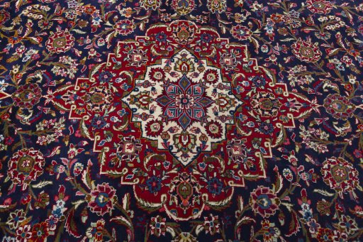 Central medallion detail of 1970s Kashan rug from Iran / Persia