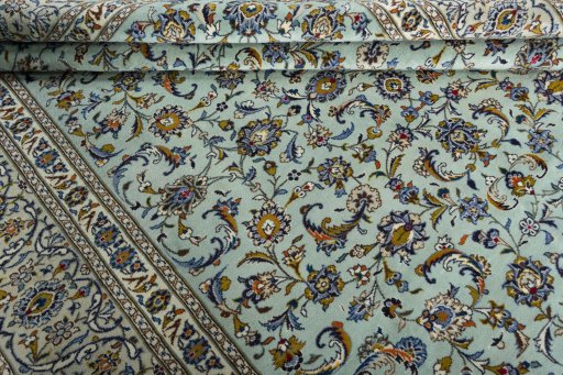 Close-up detail of 2000s Kashan rug from Iran / Persia showing Wool weave