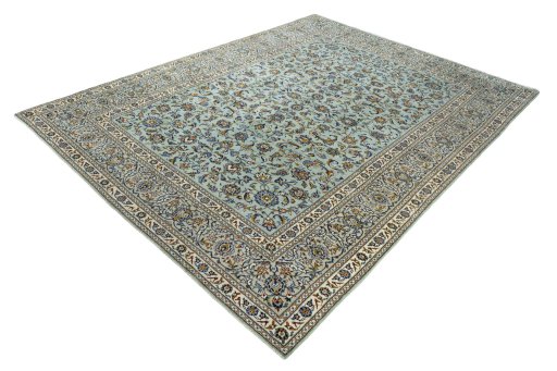 Corner detail of 2000s Kashan rug showing border pattern and Wool pile