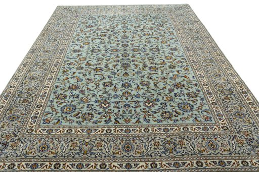 Surface texture of 2000s Kashan rug with natural Wool and intricate pattern