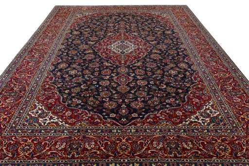 Surface texture of 2000s Kashan rug with natural Wool and intricate pattern