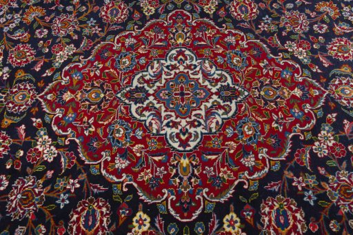 Central medallion detail of 2000s Kashan rug from Iran / Persia