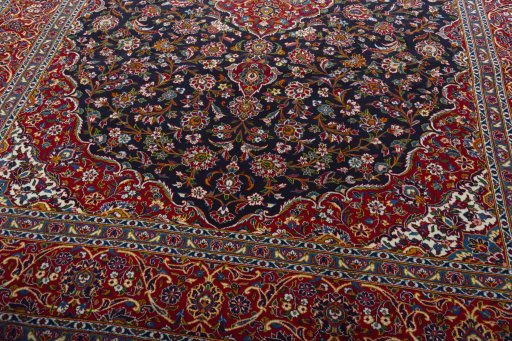 Close-up detail of 2000s Kashan rug from Iran / Persia showing Wool weave