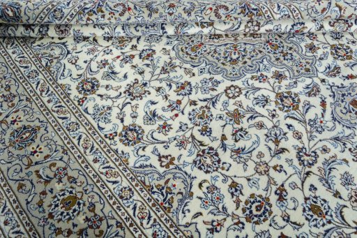 Close-up detail of 2000s Kashan rug from Iran / Persia showing Wool weave