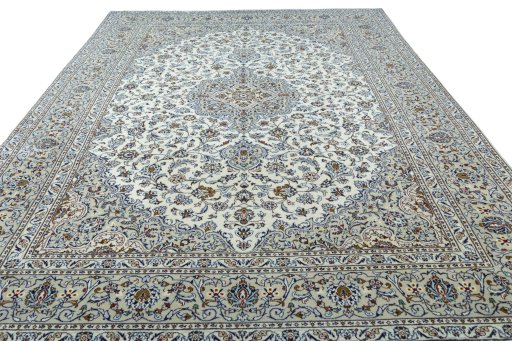 Surface texture of 2000s Kashan rug with natural Wool and intricate pattern