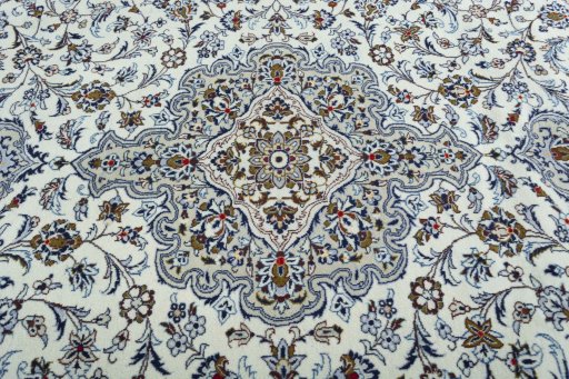 Central medallion detail of 2000s Kashan rug from Iran / Persia