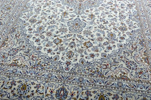 Close-up detail of 2000s Kashan rug from Iran / Persia showing Wool weave