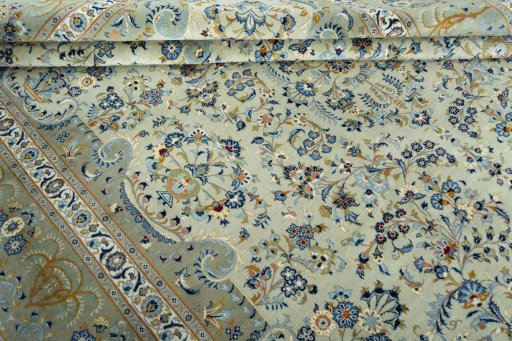 Close-up detail of 2000s Kashan rug from Iran / Persia showing Cork weave