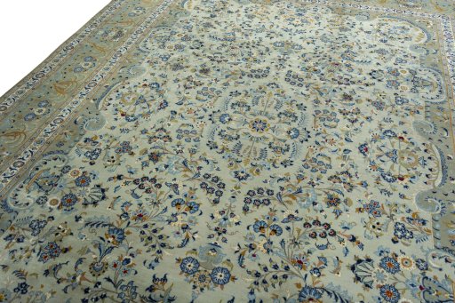Backside of handmade 2000s Kashan rug showing knot structure and weave density
