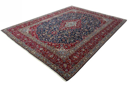 Corner detail of 2000s Kashan rug showing border pattern and Wool pile
