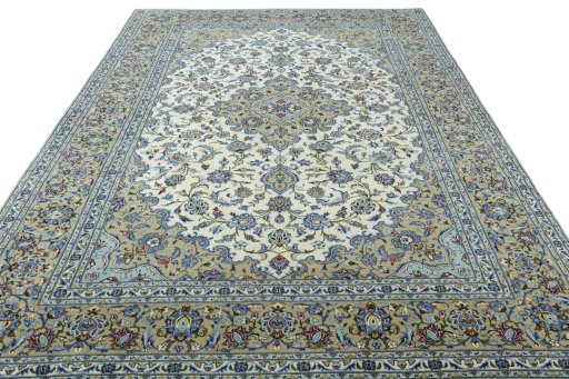 Surface texture of 2000s Kashan rug with natural Wool and intricate pattern