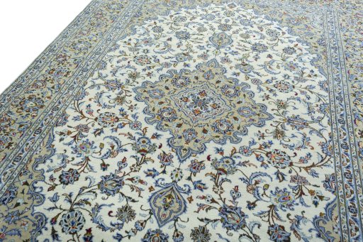 Backside of handmade 2000s Kashan rug showing knot structure and weave density