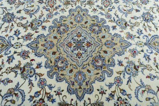 Central medallion detail of 2000s Kashan rug from Iran / Persia