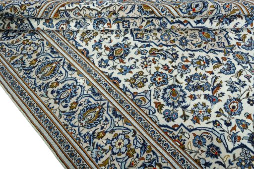 Close-up detail of 2000s Kashan rug from Iran / Persia showing Wool weave
