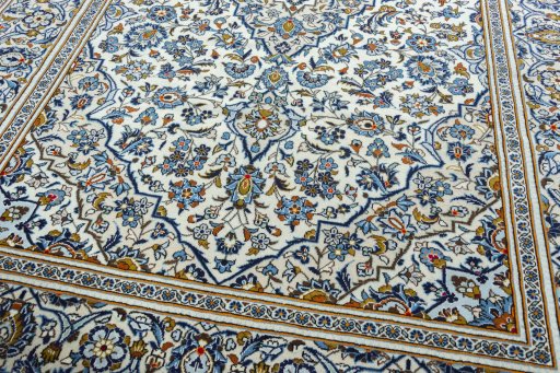 Close-up detail of 2000s Kashan rug from Iran / Persia showing Wool weave