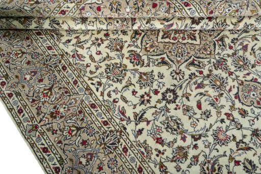 Close-up detail of 2000s Kashan rug from Iran / Persia showing Wool weave