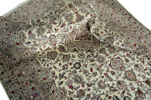 Surface texture of 2000s Kashan rug with natural Wool and intricate pattern