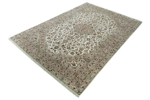 Corner detail of 2000s Kashan rug showing border pattern and Wool pile
