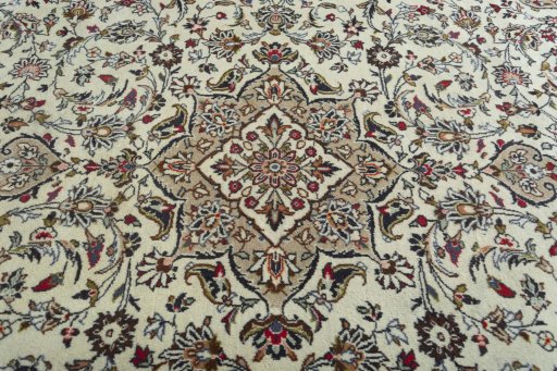 Central medallion detail of 2000s Kashan rug from Iran / Persia